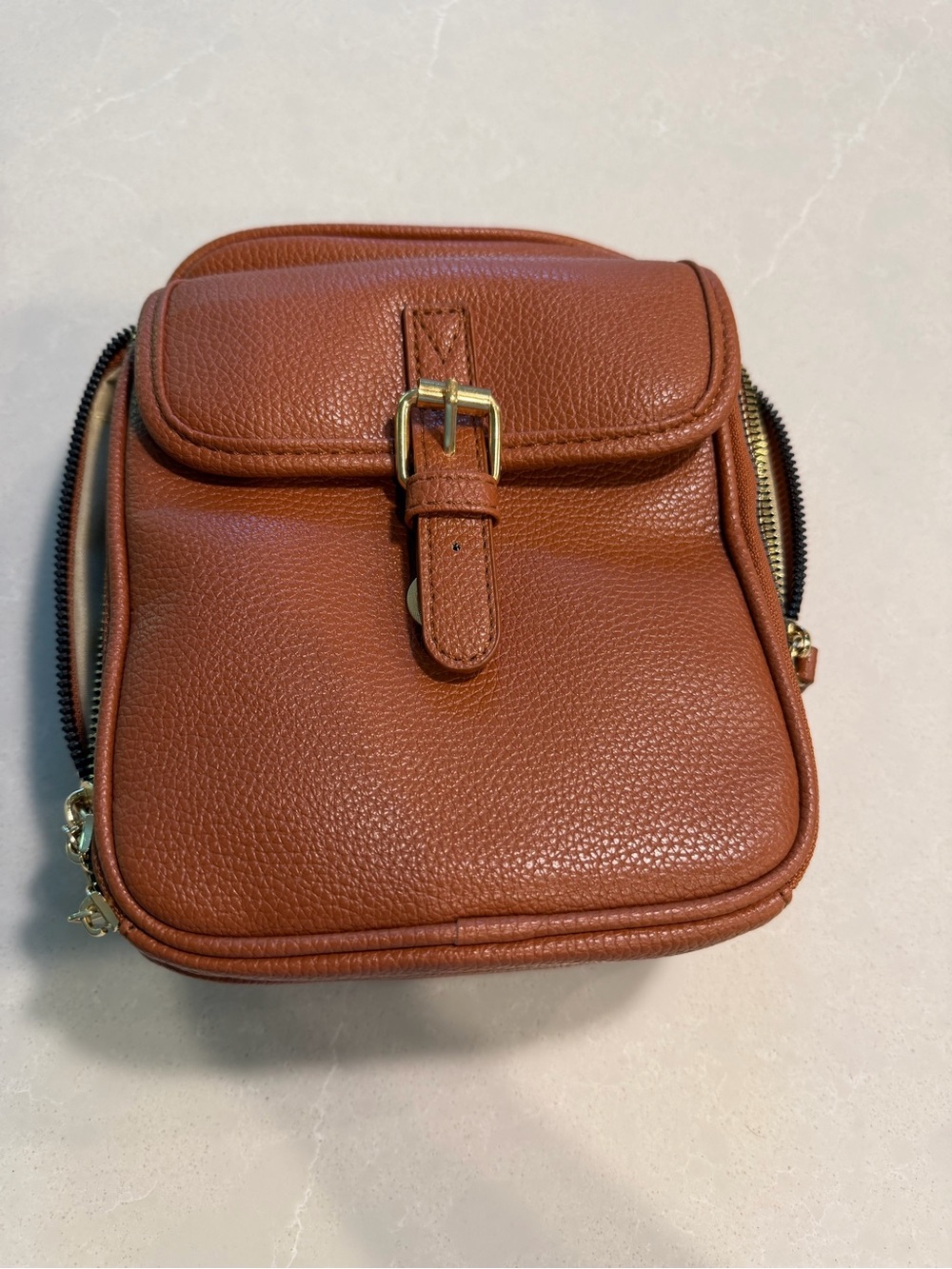 Brand New crossbody bag. Multiple pockets. Brown (camel color)